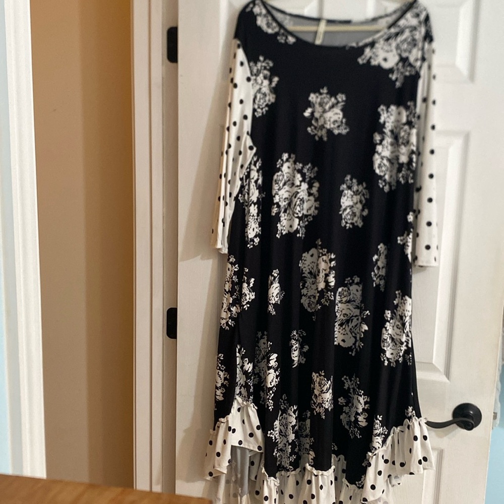 Black and white polka dot flowered ruffle dress